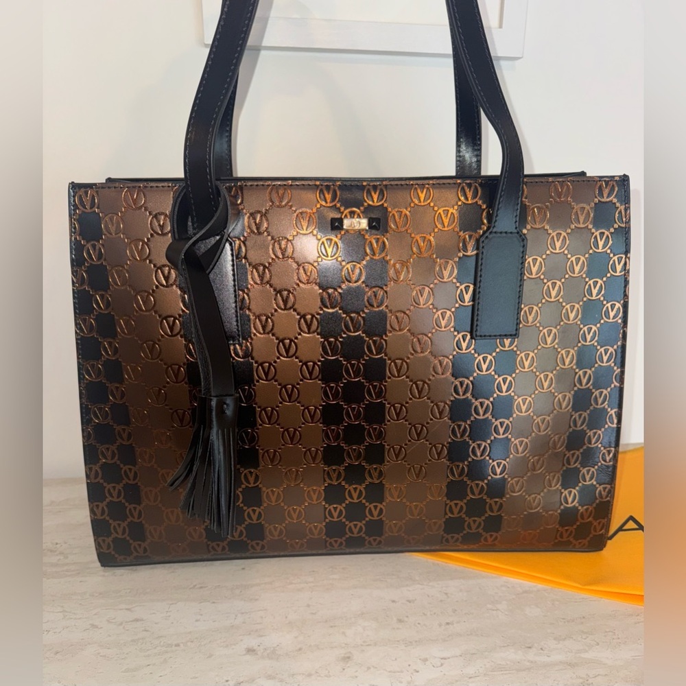 Pauline Monogram Stripes Leather Shoulder Bag
VALENTINO BY MARIO VALENTI…
